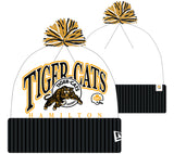 Hamilton Tiger-Cats 2025 New Era Spirit Turf Traditions Cuffed Pom Knit Hat - Black