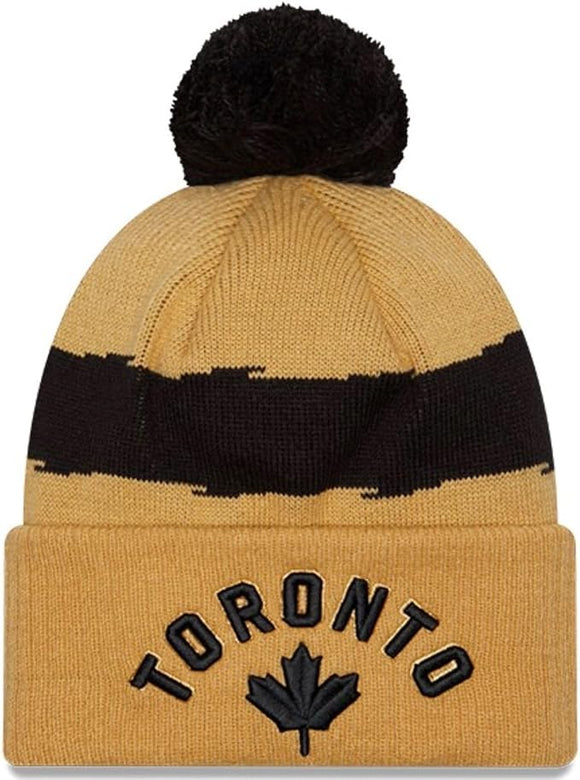 Men's New Era Black Toronto Raptors 2023/24 City Edition Official Cuffed Pom Knit Hat