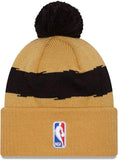 Men's New Era Black Toronto Raptors 2023/24 City Edition Official Cuffed Pom Knit Hat