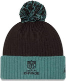 Men's New Era Black/Green Philadelphia Eagles 2024 Inspire Change Cuffed Knit Hat with Pom