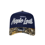 Men's Toronto Maple Leafs Script NHL New Era 9Forty A-Frame Snapback Hat - Navy/RealTree