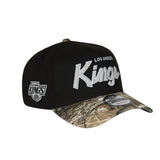 Men's Los Angeles Kings Script NHL New Era 9Forty A-Frame Snapback Hat - Black/RealTree