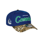 Men's Vancouver Canucks Script NHL New Era 9Forty A-Frame Snapback Hat - Royal/RealTree