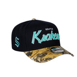 Men's Seattle Kraken Script NHL New Era 9Forty A-Frame Snapback Hat - Navy/RealTree