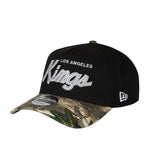 Men's Los Angeles Kings Script NHL New Era 9Forty A-Frame Snapback Hat - Black/RealTree