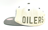 Men’s NHL Edmonton Oilers Mitchell & Ness Black Tape Snapback Hat – Beige