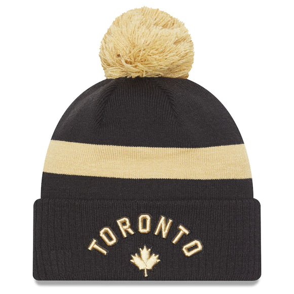 Men's New Era Black Toronto Raptors 2022/23 City Edition Official Cuffed Pom Knit Hat