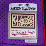 Men's Toronto Raptors Hakeem Olajuwon Mitchell & Ness Purple 2001-02 Hardwood Classics Swingman Jersey