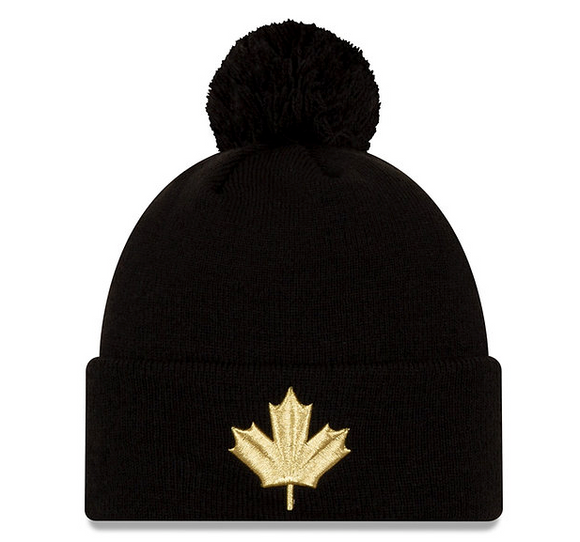 Men's New Era Black Toronto Raptors 2022/23 Alt Logo City Edition Official Cuffed Pom Knit Hat