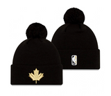 Men's New Era Black Toronto Raptors 2022/23 Alt Logo City Edition Official Cuffed Pom Knit Hat