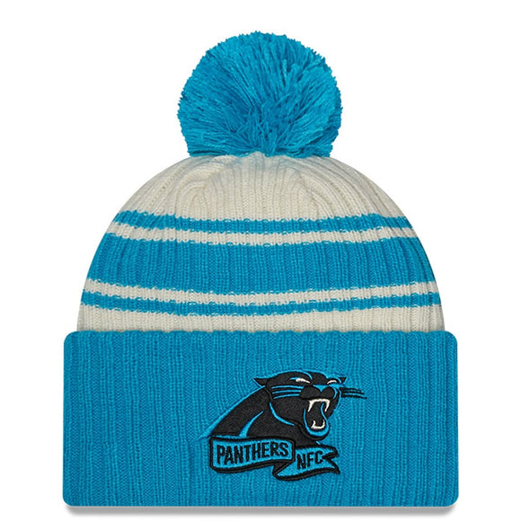 Men's Carolina Panthers New Era Cream/Blue 2022 Sideline Sport Cuffed Pom Knit Hat