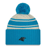 Men's Carolina Panthers New Era Cream/Blue 2022 Sideline Sport Cuffed Pom Knit Hat