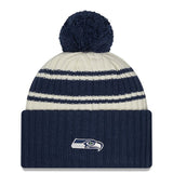 Men's Seattle Seahawks New Era Cream/College Navy 2022 Sideline Sport Cuffed Pom Knit Hat