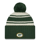 Men's Green Bay Packers New Era Cream/Green 2022 Sideline Sport Cuffed Pom Knit Hat