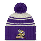Men's Minnesota Vikings New Era Cream/Purple 2022 Sideline Sport Cuffed Pom Knit Hat