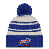 Youth Buffalo Bills New Era Cream/Royal 2022 Sideline Sport Cuffed Pom Knit Hat