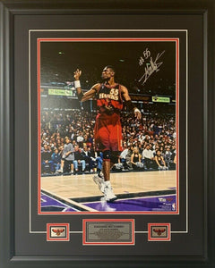 Dikembe Mutombo Atlanta Hawks Autographed 16" x 20" Finger Waving Photo Framed with Plaques